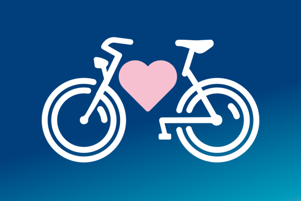 FKT Fahrrad Grafik eines blauen Fahrrads mit einem rosa Herz in der Mitte.